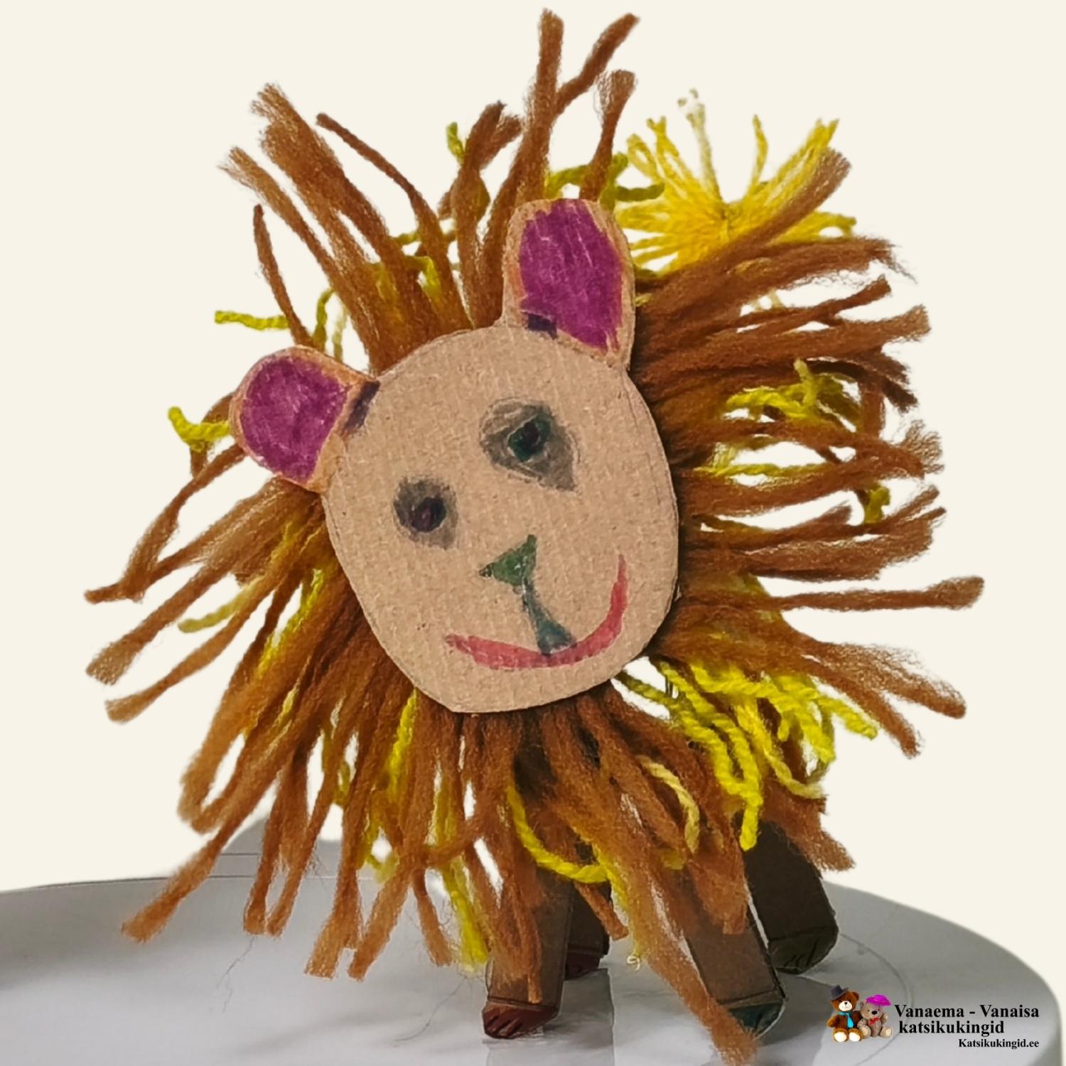 Lastega meisterdatud lõvi WC-paberi rullist lõngast lakaga