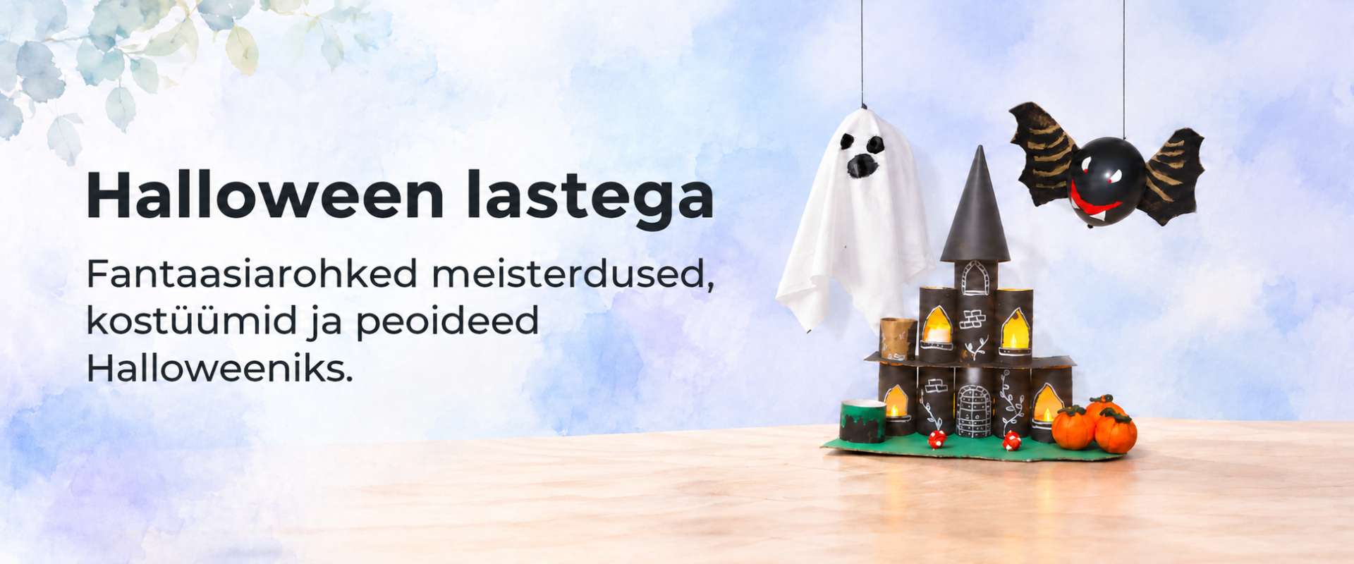Papptorudest valgustatud loss, riidest kummitus ja õhupallist nahkhiir Halloweeni käsitöönurgas